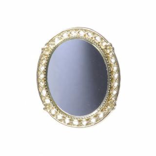 Oval brass mirror